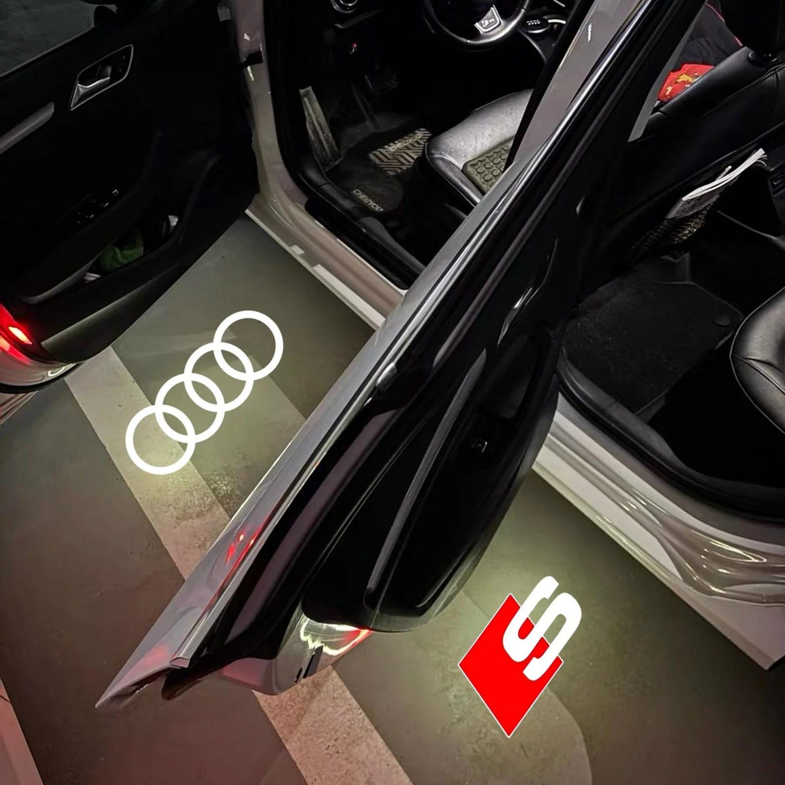 Audi logo projectors for doors